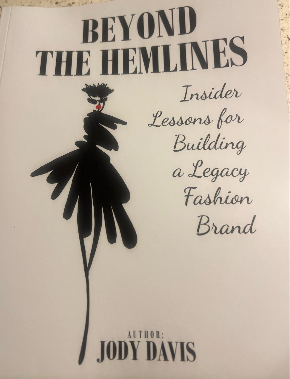 BEYOND THE HEMLINES Book